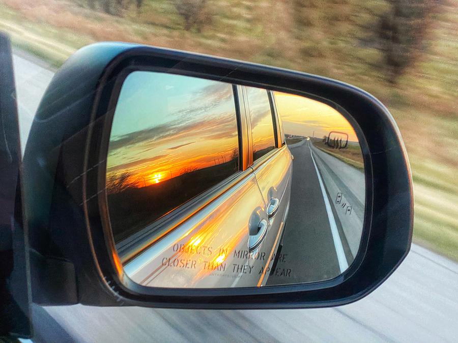 Sunset in the Rearview Mirror  Photograph by Debra Martz
