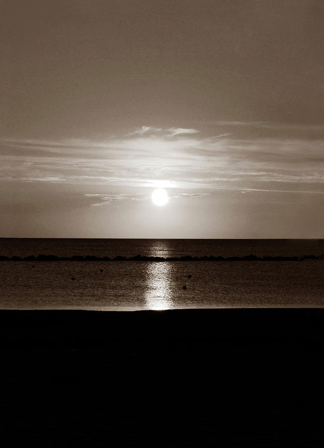 Sunset in the sea, sepia color Photograph by Severija Kirilovaite
