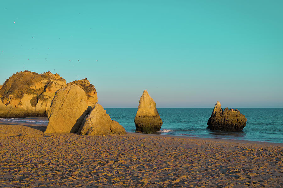 Sunset in Three Brothers Beach. Algarve Photograph by Angelo DeVal