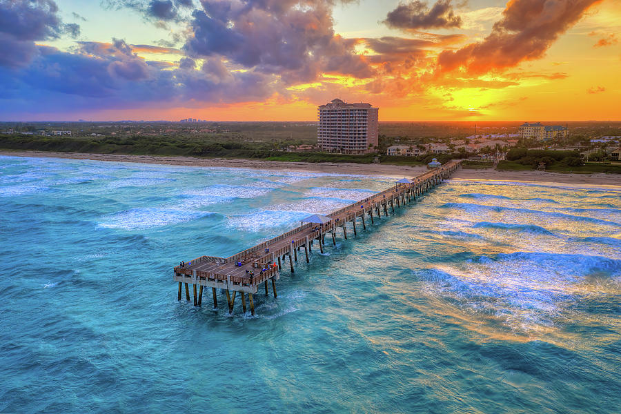 Sunset Juno Beach Pier Over the Ocean Florida Photograph by Kim Seng