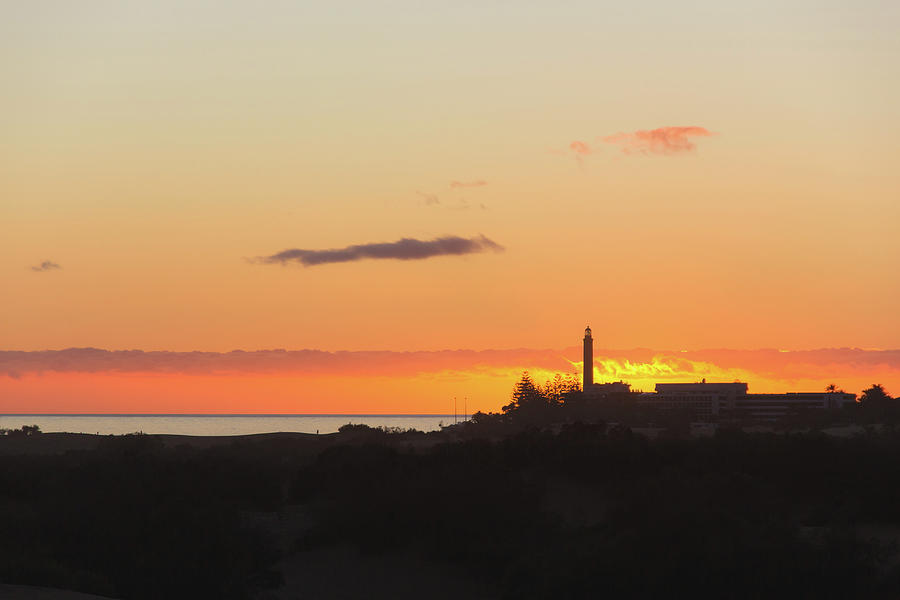 Sunset Lighthouse Photograph by Josu Ozkaritz