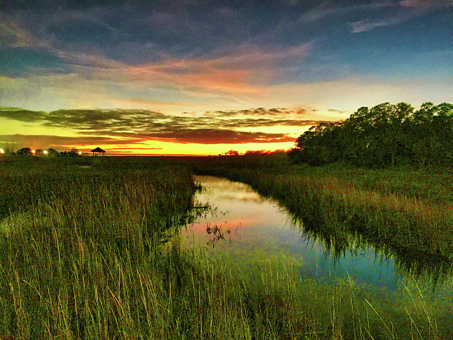 Sunset Marsh Grass Estuary With Colorful Clouds Reflecting In Creek ...