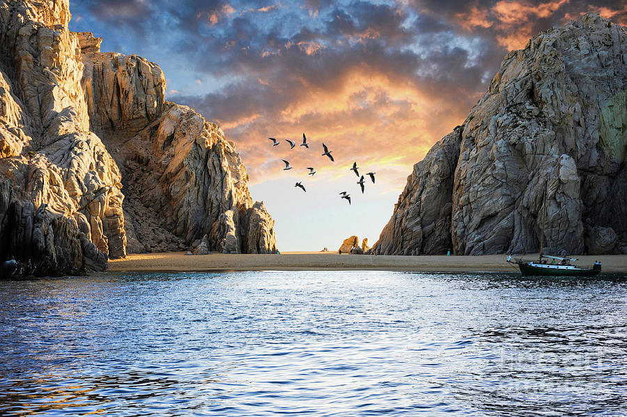 Sunset on a little beach close to Cabo San Lucas El Arco Arch. Photograph by Gunther Allen