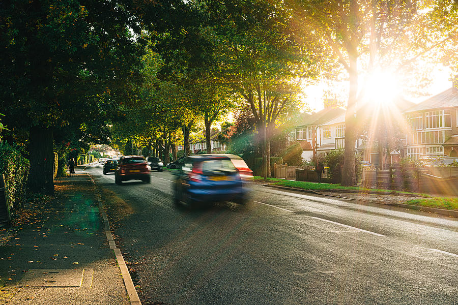 Sunset on a surburban street in Surrey, UK Photograph by Karl Hendon
