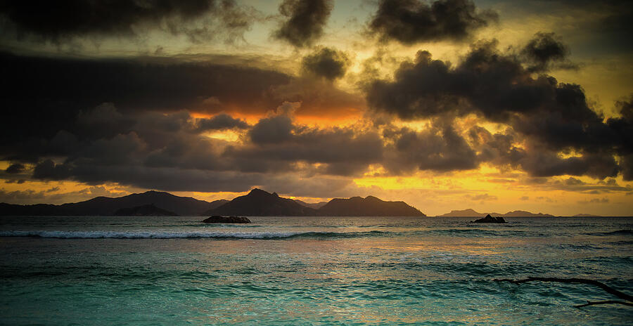 Sunset on Praslin Island Photograph by Jean-Luc Farges