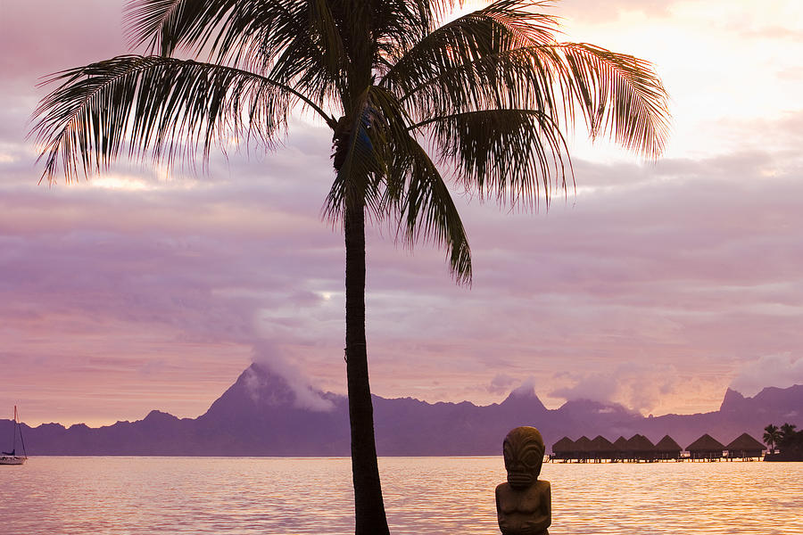 Sunset on tahiti with view of moorea Photograph by Image Source