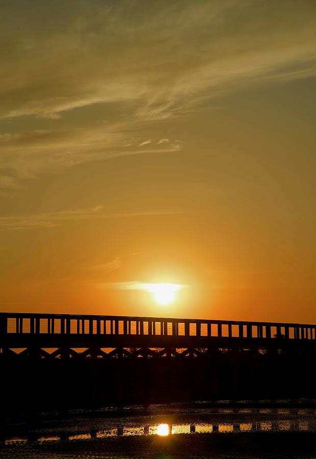 Sunset On The Boardwalk Photograph by Dennis Schmidt