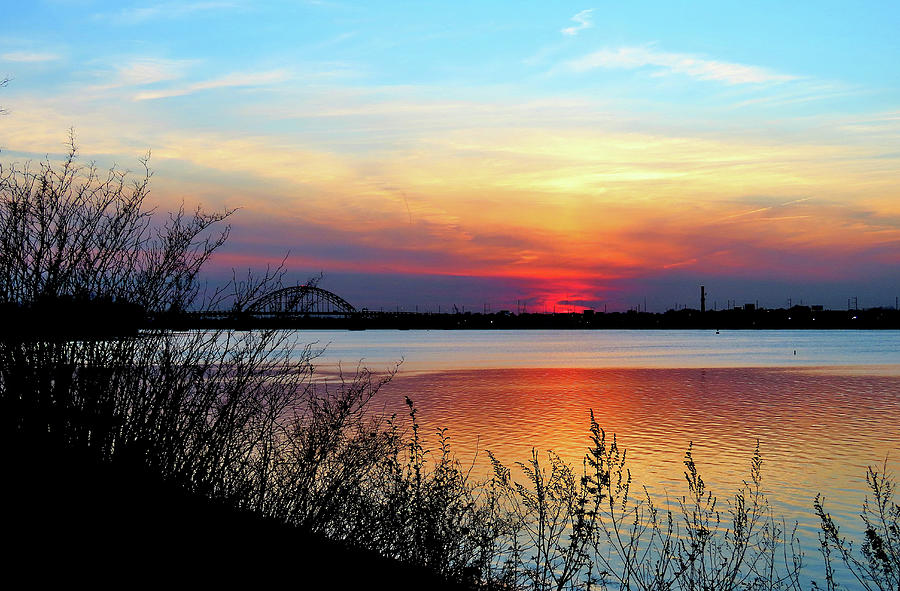 Sunset on the Delaware River With Tacony Palmyra Bridge to Philadelphia Photograph by Linda Stern