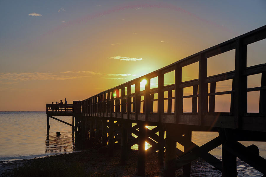 Sunset on the Pier at Crystal Beach Florida Photograph by Bill Cannon