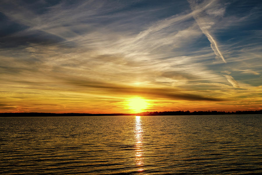 Sunset Over a Lake Photograph by Doug Long