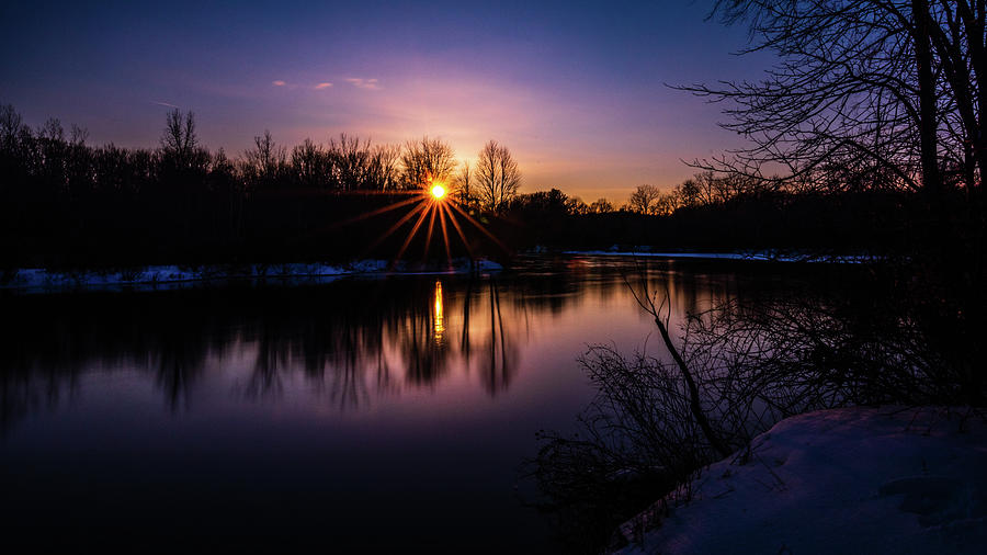 Sunset Over a river Photograph by Nathan Wasylewski
