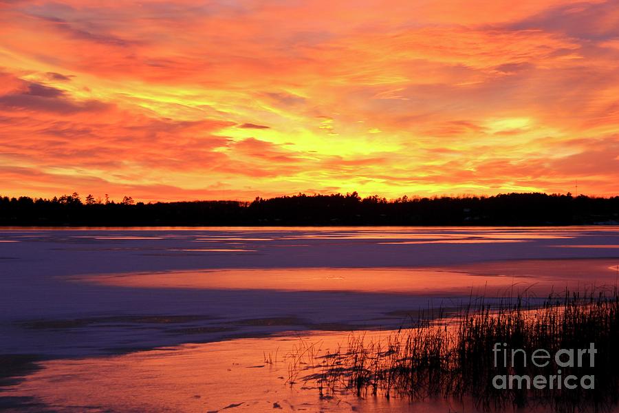 Sunset Over a Snowy Icy Lake Minnesota Photograph by Ann Brown