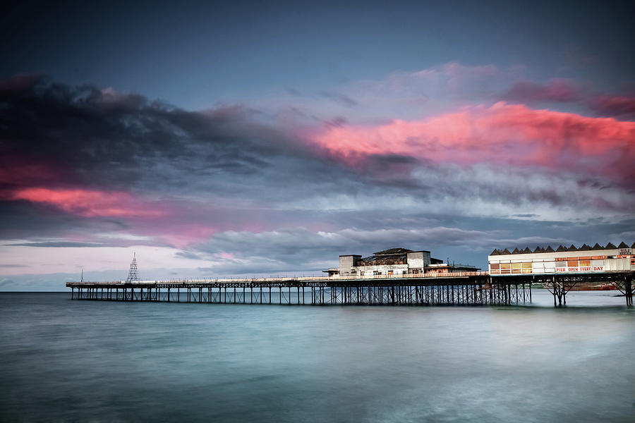 Sunset over Colwyn Bay Pier, North Wales UK Photograph by Christine ...