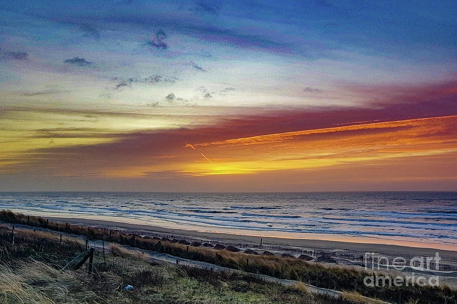 Sunset over dutch beach Photograph by Casper Cammeraat
