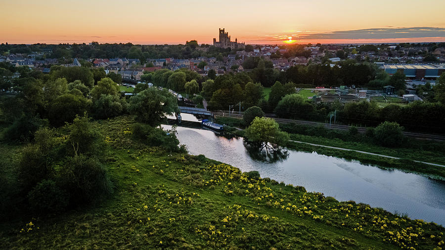 Sunset over Ely Riverside Photograph by James Billings