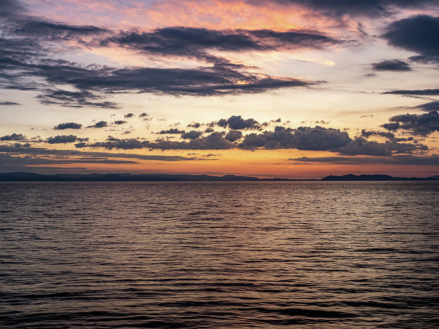 Sunset over Omura Bay Photograph by Dave Hansche - Fine Art America