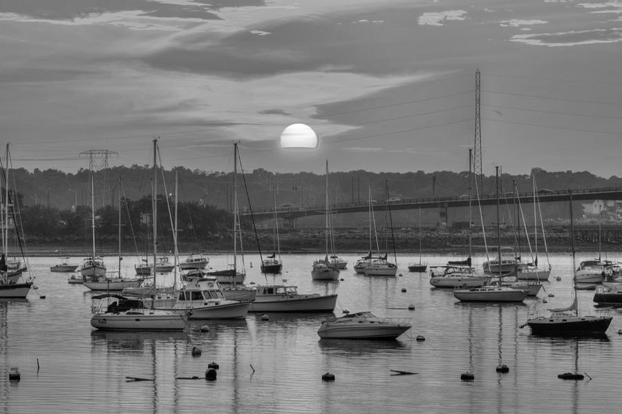 Sunset over Salem Harbor Salem Beverly bridge Black and White Photograph by Toby McGuire