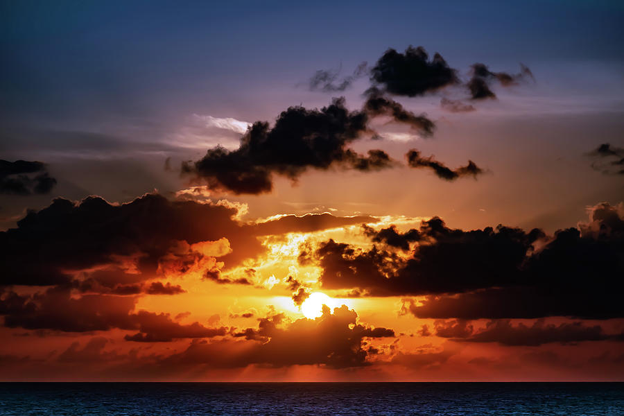 Sunset over sea Photograph by Jake Walker
