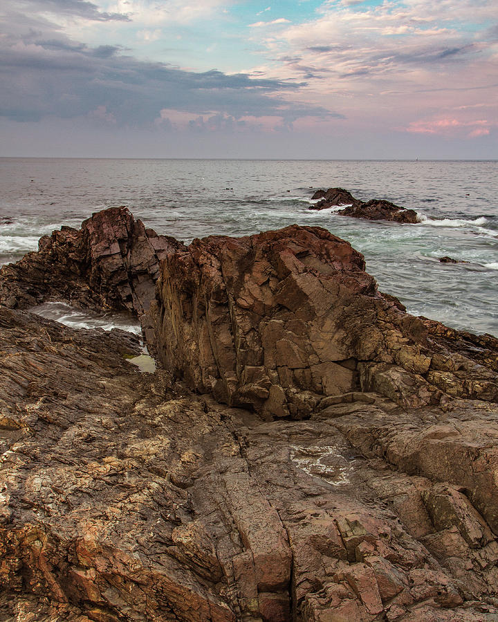 Sunset Over The Atlantic Ocean With A Rocky Shoreline And Storm Clouds In Ogunquit, Maine Photograph