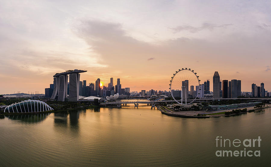 Sunset over the famous Singapore financial district and the Sing Photograph by Didier Marti