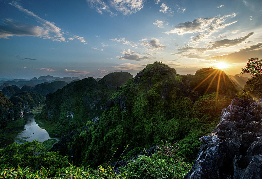 Vietnam Photograph - Sunset over the peaks of Ninh Binh by Ellis Peeters