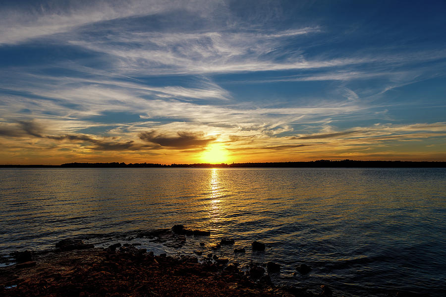 Sunset over Thunderbird Lake Photograph by Doug Long
