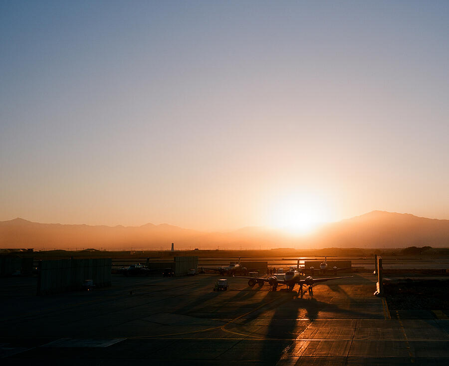 Sunset over United States Air Force airport Photograph by Brian Wilson