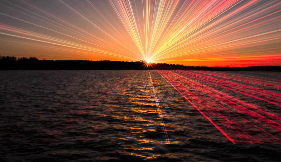 Sunset Rays Traveling  Photograph by Ed Williams