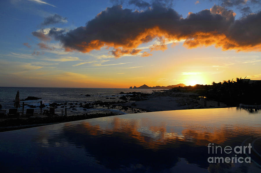 Sunset reflecting Cabo San Lucas Photograph by Gunther Allen