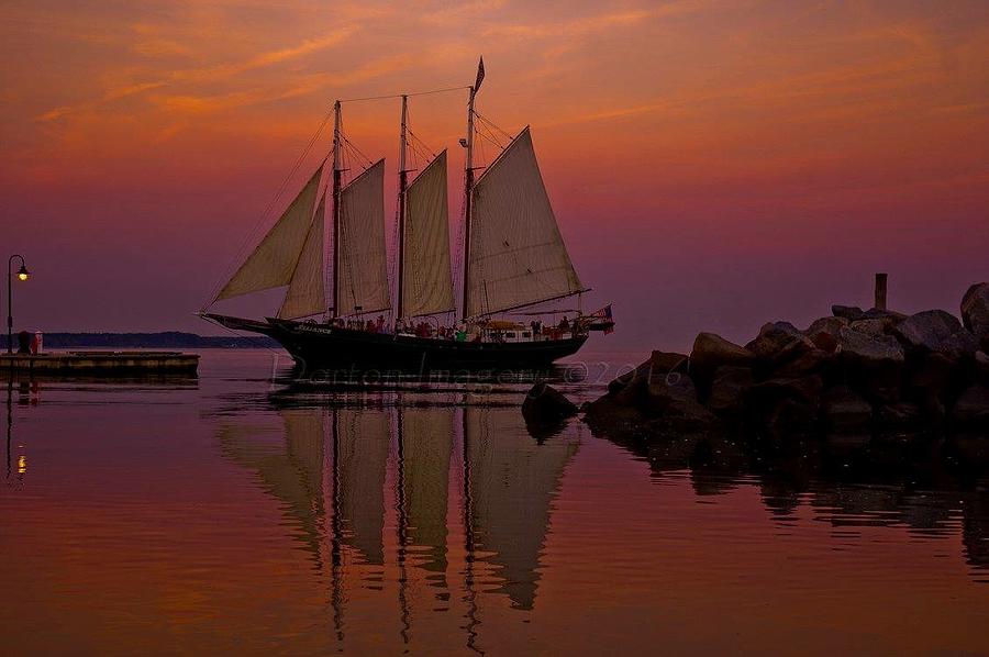 Sunset sail Photograph by Stephen Dorton