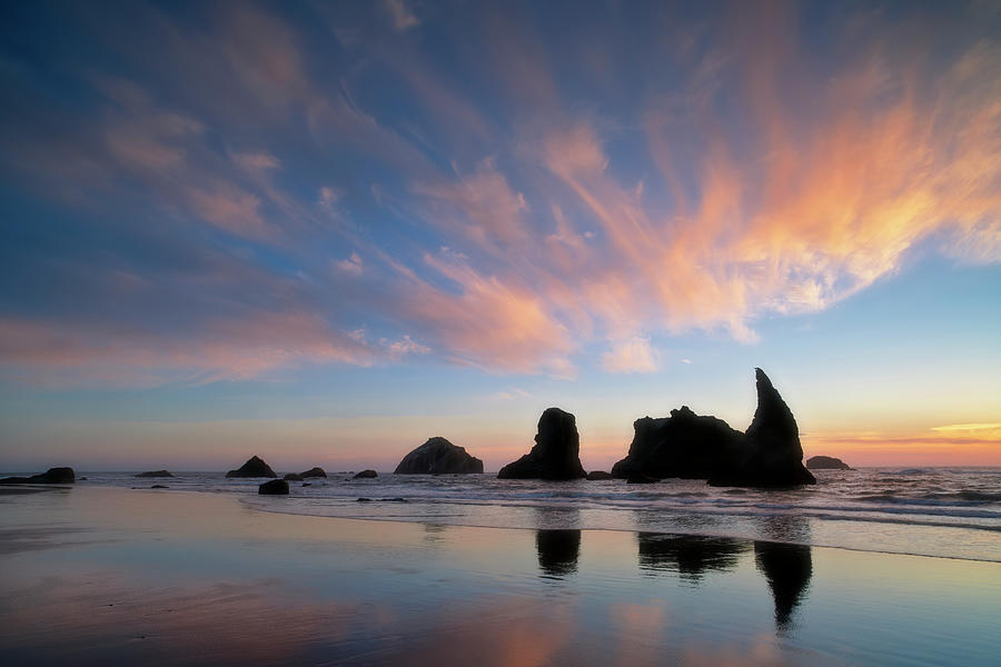 Sunset silhouette reflections at Oregon's Bandon Beach. Photograph by ...