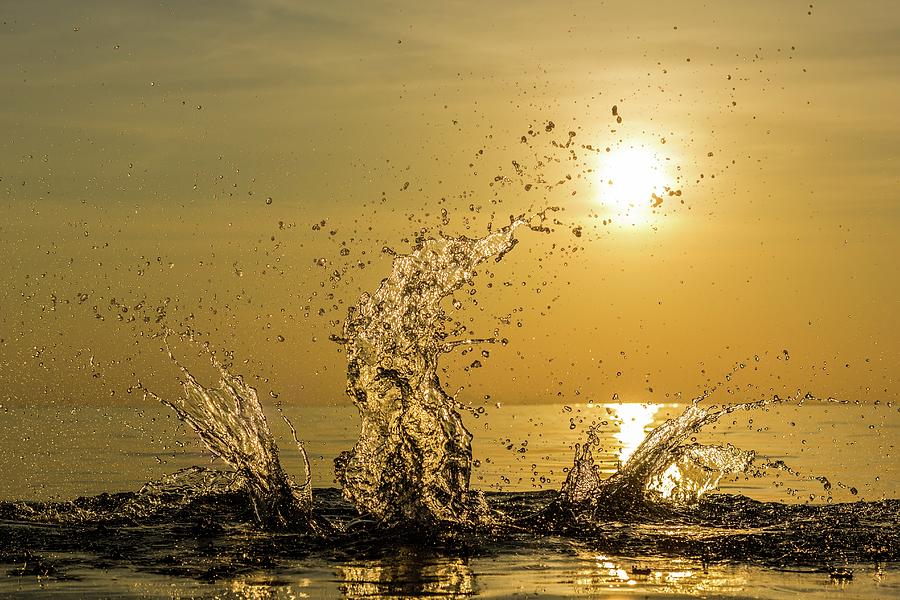 Sunset Splash Photograph by Josu Ozkaritz
