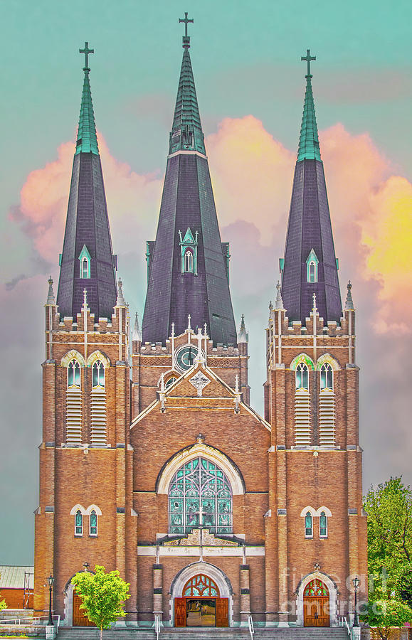 Sunset steeples Photograph by Susan Vineyard