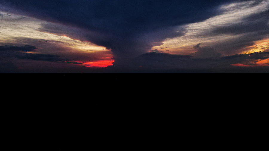 Sunset storm  Photograph by Stephen Dorton