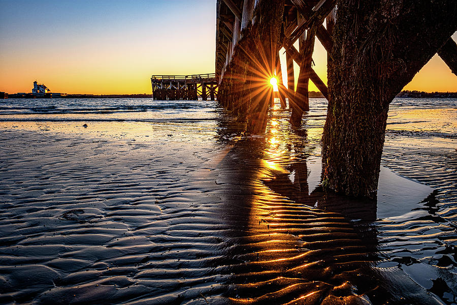 Sunset Under The Pier Photograph by Jeff Sinon