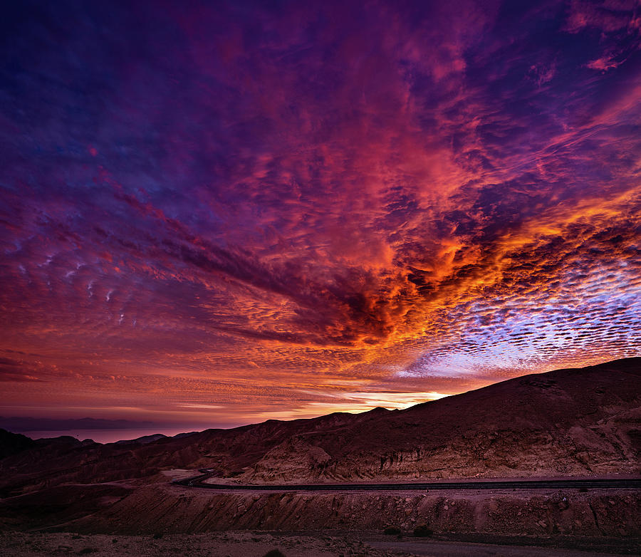 Sunset view above desert in Israel. Photograph by Kristian Sekulic