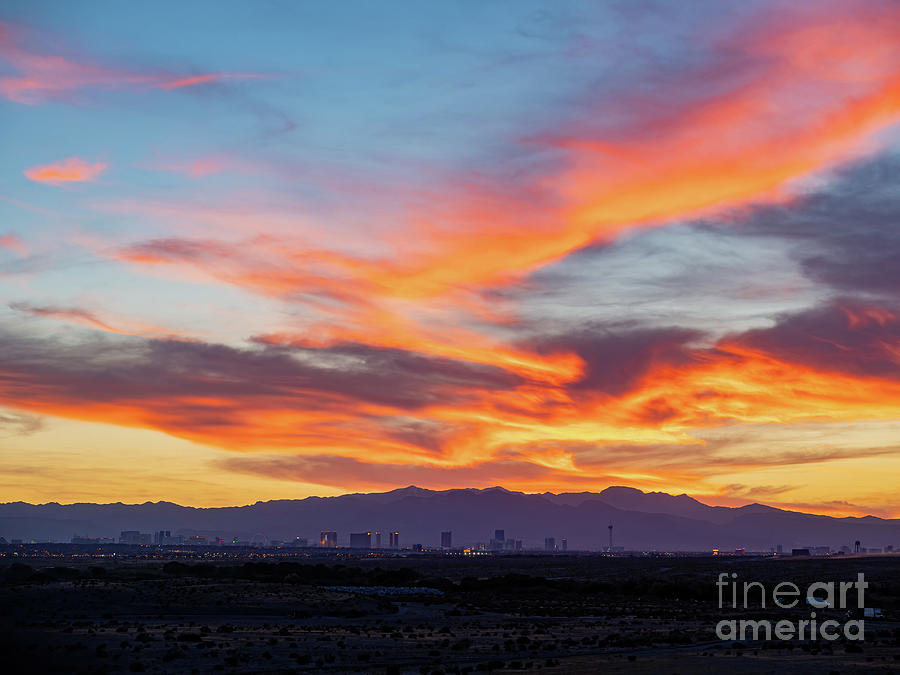 Las Vegas Photograph - Sunset view of the beautiful strip skyline with red clouds by Chon Kit Leong