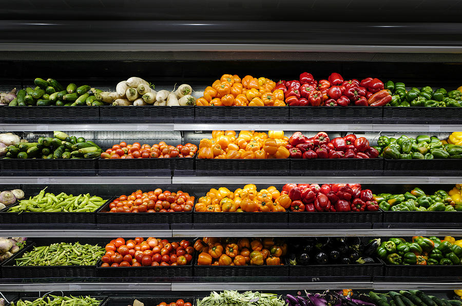 Supermarket organic vegetables shelf Photograph by Artur Carvalho