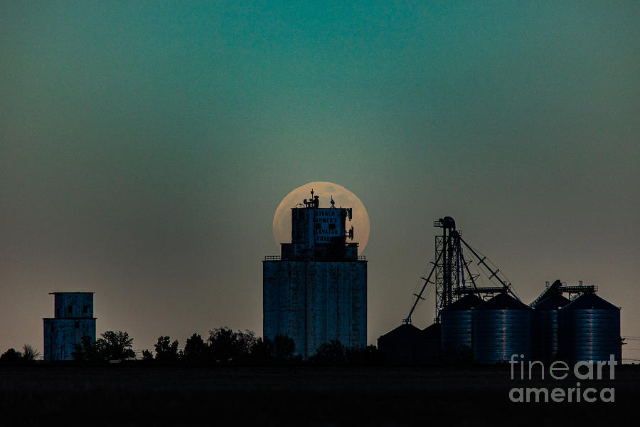 Supermoon at grain elevator in Bennett, Colorado Photograph by JD Smith