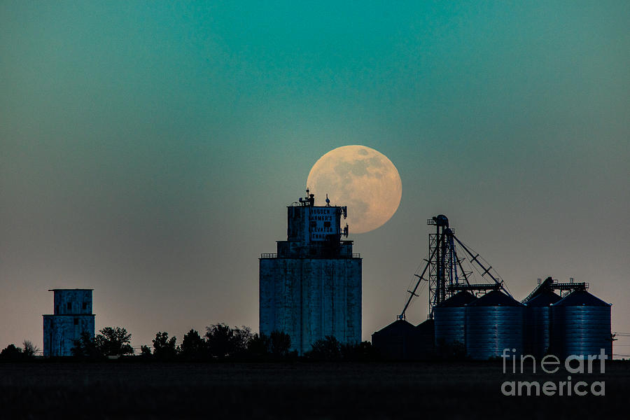 Supermoon rise over Bennett, Colorado Photograph by JD Smith
