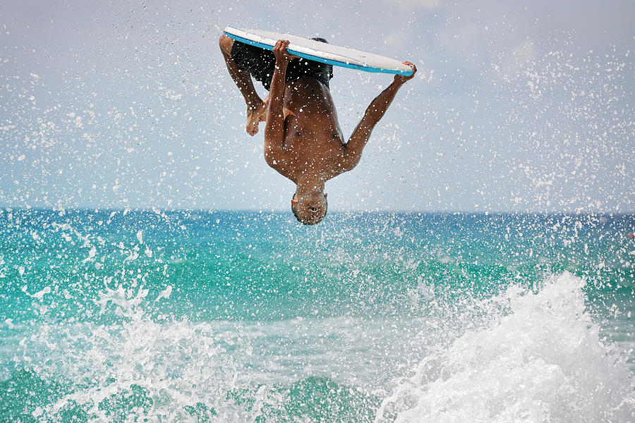 Surfer doing a backflip Photograph by 4fr