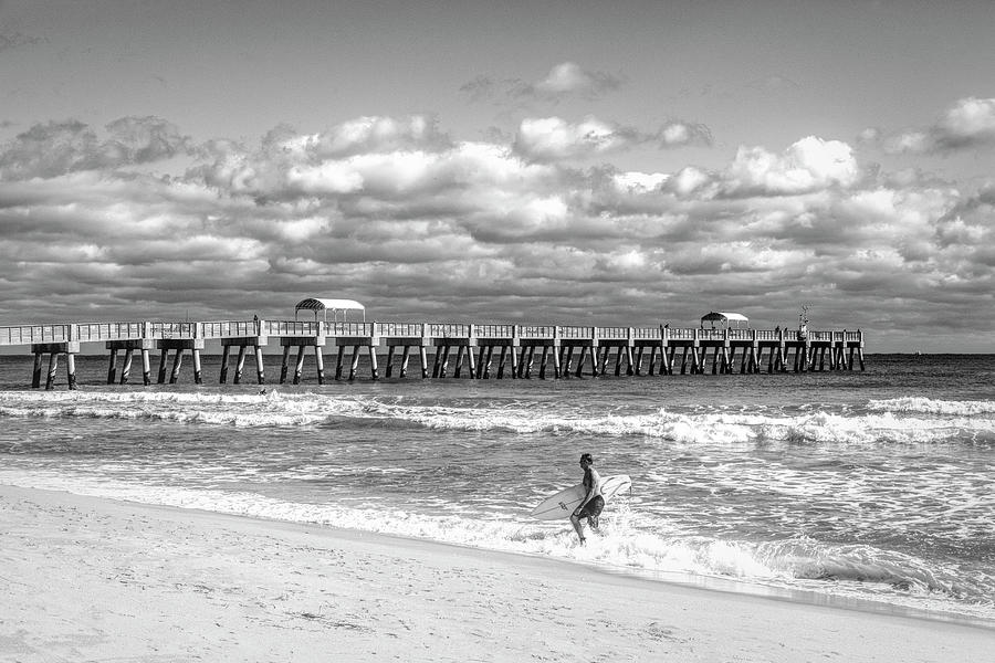 Surfer in the Sun Black and White Photograph by Debra and Dave Vanderlaan