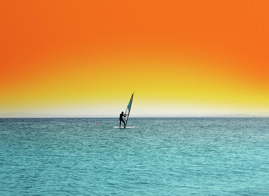 Surfer On Blue Sea Under Orange Sky Digital Art by Mikhail Kokhanchikov