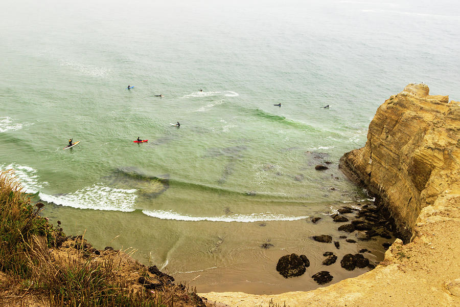 Surfers at Beaverly Beach, Oregon Photograph by Aashish Vaidya