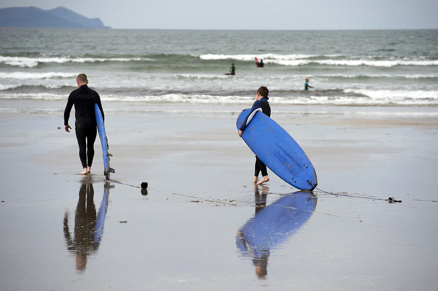 Surfing at Inch beach of Kerry County in Ireland Photograph by Feifei Cui-Paoluzzo