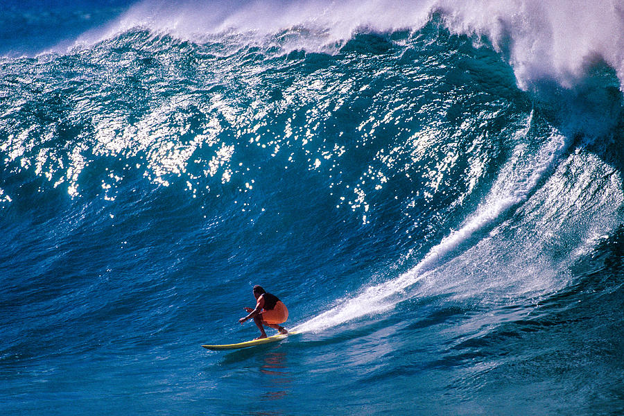 Surfing at Waimea Bay Photograph by John Seaton Callahan