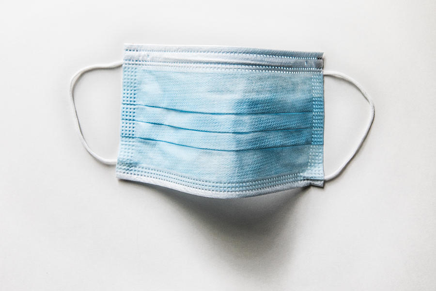 Surgical mask on white background Photograph by MoMo Productions