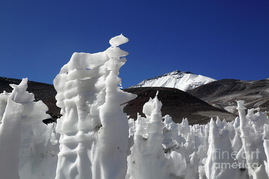 Surreal ice sculptures and Ojos del Salado volcano Chile Photograph by James Brunker
