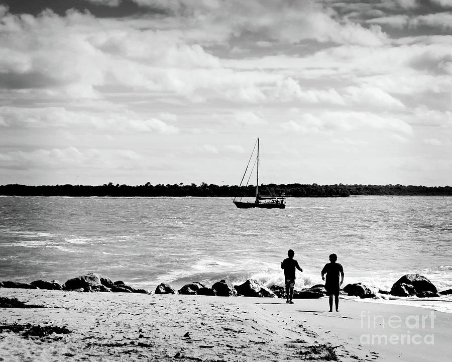 Surroundings-Kids on the Beach Sailboat Photograph by Chris Andruskiewicz