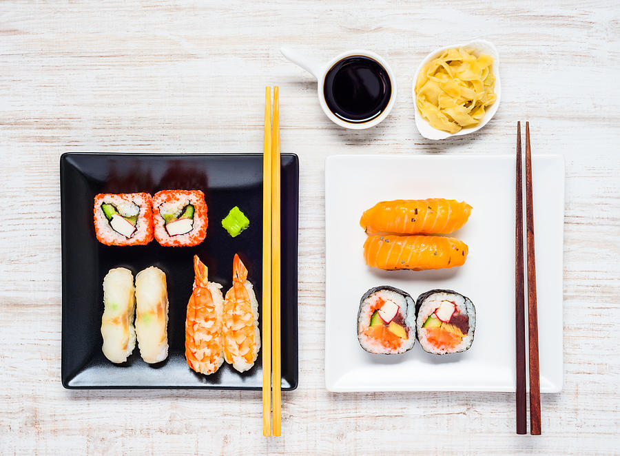 Sushi on Two Plates with Soy Sauce and Ginger Photograph by Xfotostudio